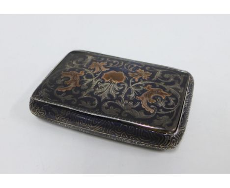 19th century Russian silver snuff box, rectangular form with rounded corners, the cover with niello work and inlaid with yell