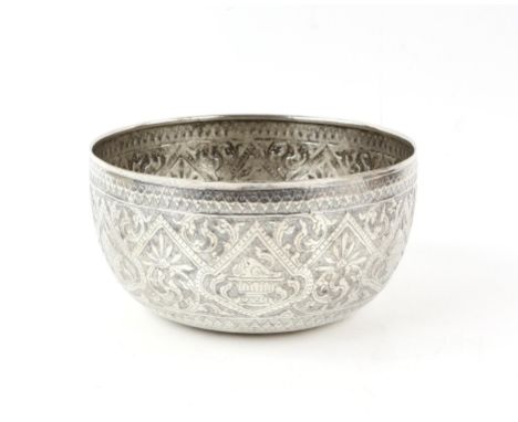 Far Eastern silver bowl with hammered and embossed decoration of repeating shells on plinths, 17.5cm diameter, 7.7oz, 240g,