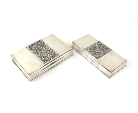 Two Thai silver presentation cigarette boxes, the covers with embossed figural and scrolling decoration, by Sykka, marked 'St