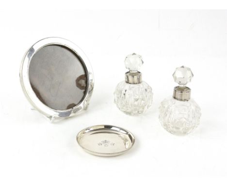 Pair of silver mounted glass perfume bottles London 1905, a Danish sterling silver dish and round silver photo frame by Herbe