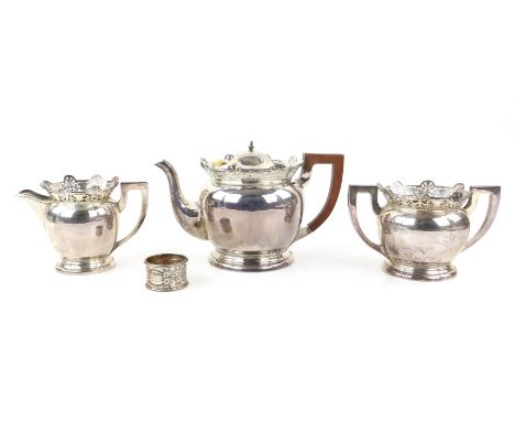 George V silver 3 piece tea service of globular form with raised pierced floral edging to tops, comprising teapot, sugar pot,