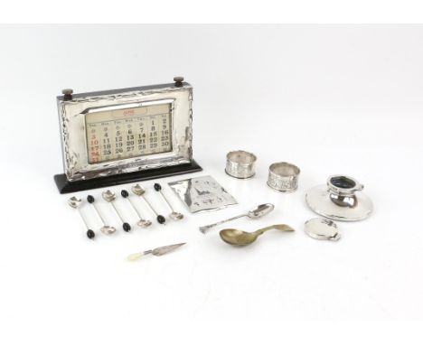 Silver presentation desk calendar, Birmingham 1927, capstan inkwell, page mark, coffee spoons, caddy spoon, tea spoon and two