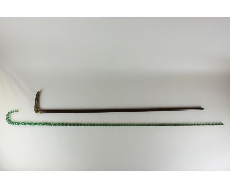 A green spiral glass walking stick, 118cm, and a horn handled cane