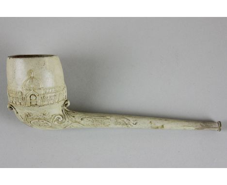 A white clay smoker's pipe, the bowl decorated with carving of Alexandria Palace and incised scrollwork, marked C Crop London