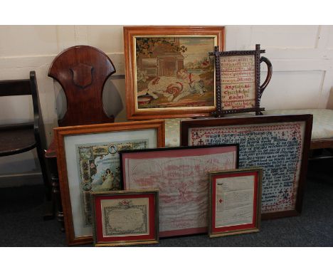 A wool work sampler by Amy Ethel Hill 1892, together with a religious wool work panel, a tapestry panel and a printed commemo