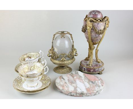 A gilt metal and marble urn lamp base together with a glass and gilt lamp, four floral and gilt tea cups and saucers and a pi