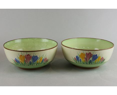 A pair of Clarice Cliff crocus pattern fruit bowls with Wilkinson honeyglaze and gilt printed Clarice Cliff marks to base, 22