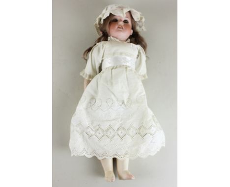 An Armand Marseille bisque head and shoulder doll, 370 MODEP, with sleeping eyes and open mouth, composite limbs and leather 