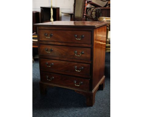 A 19th century mahogany small chest of four drawers with drop swan handles, on bracket feet, 53cm 