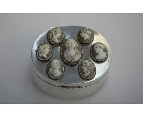 ***ADDITIONAL LOT***A CONTINENTAL WHITE METAL, AGATE AND CAMEO MOUNTED BOX AND COVER, 19th century, of oval form, the hinged 