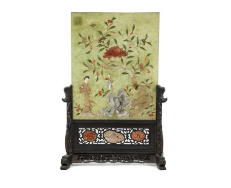 A CHINESE CARVED CHERRYWOOD AND HARDSTONE TABLESCREEN, decorated with a female musician and rockwork against a rectangular ja