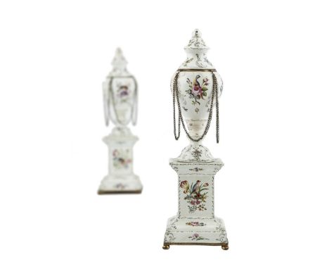 A PAIR OF 18TH CENTURY BILSTON ENAMEL CASSOLETTES, of classical urn form, each cover reversing to form candle sconces, hung w