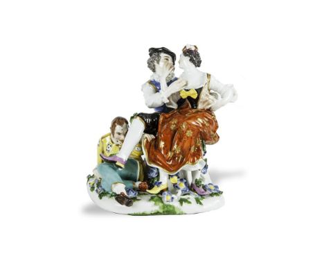 AN 18TH CENTURY MEISSEN GROUP OF THE INDISCREET HARLEQUIN By J.J Kandler, c. 1742Provenance : Winifred Williams Antiques, Eas