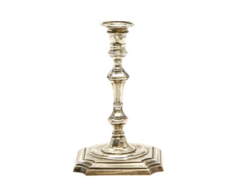 A George III style silver taper stick, London, 1895, turned column support and square base, makers mark T.B, 11.5cm high