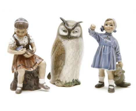 Two D J Copenhagen figures of girls, one holding a teddy bear, the other a puppet, 14.5cm, and a Royal Copenhagen owl, chip t