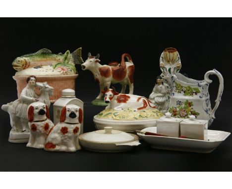 A collection of Victorian and later pottery, a cow creamer, a butter dish, Copenhagen anniversary caddy, desk stand, etc
