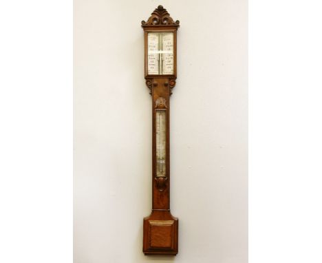 A walnut stick barometer, by E.H. Robinson, London and Shrewsbury, c.1890, with scroll carved crest and subsidiary thermomete