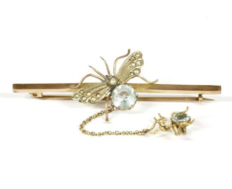 A gold blue paste stone moth and spider bar brooch, with seed pearl wings and a blue paste stone and seed pearl spider on sus