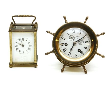 A small Schatz ships wheel clock, together with a small brass cased carriage clock