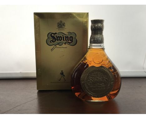JOHNNIE WALKER SWING
Blended Scotch Whisky. 
75cl, no strength stated, in box.  CONDITION REPORT: Damage to box, bottle in go