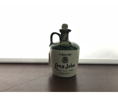 LONG JOHN 12 YEARS OLD
Blended Scotch Whisky. 
No capacity or strength stated, in green/white flagon.  CONDITION REPORT: Some