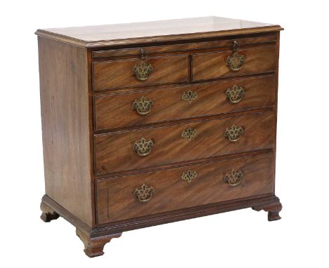 A George III Mahogany and Oak-Lined Bachelor's Chest, late 18th century, the moulded top with pull-out brushing slide above t
