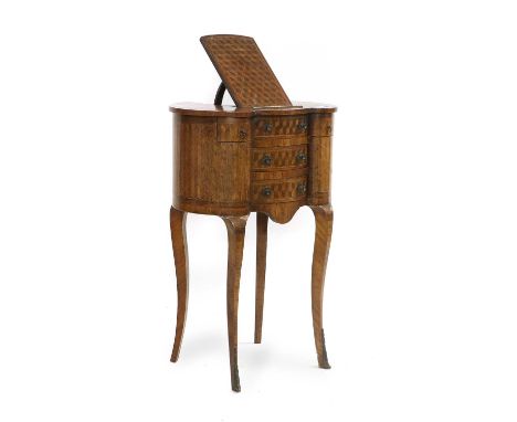 A French Kingwood and Parquetry-Decorated Occasional Table, late 19th century, the quarter-veneered top with pivoting bookres