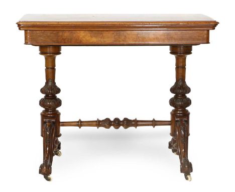 A Victorian Figured Walnut Foldover Card Table, circa 1870, of moulded rectangular form, the pivoting top enclosing a green b
