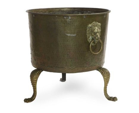 A Regency-Style Rivetted Cylindrical Brass Planter/Log Bin, late 19th/early 20th century, with brass lion mask loop handles, 