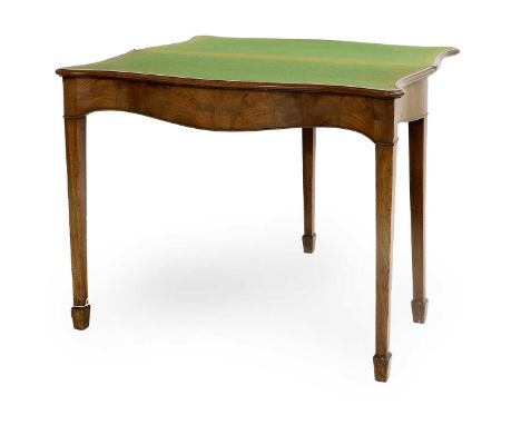 A George III Mahogany Serpentine Foldover Card Table, late 18th century, the hinged leaf enclosing a green baize-lined interi