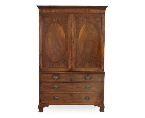 A George III Mahogany, Satinwood-Crossbanded, Boxwood and Ebony-Strung Linen Press, late 18th century, the cavetto cornice ab