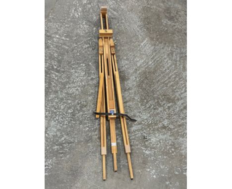 A wooden easel by Rowney. 