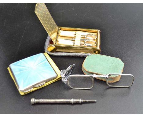 An Art Deco design combination powder compact, lipstick holder with musical movement, a silver and guilloche enamel powder co