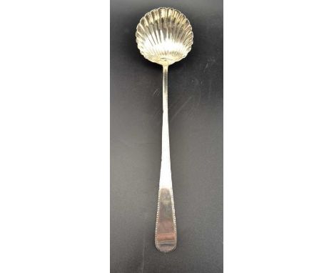 Hester Bateman, a George III silver ladle with scallop form bowl, London 1775, 141g