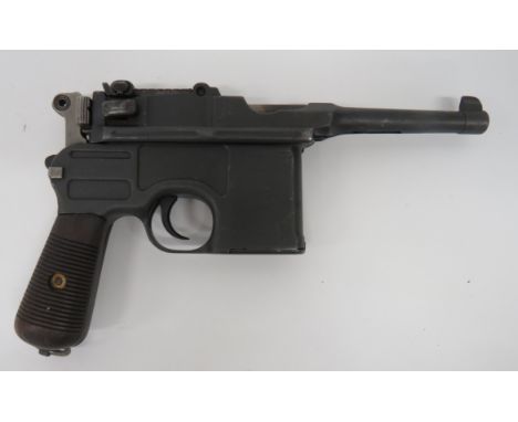 Deactivated C96 Mauser Small Ring Hammer Auto Pistol 7.63 mm, 3 3/4 inch, blackened barrel with front fixed sight.  Blackened