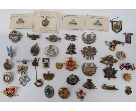 Selection of Various Sweetheart Lapel Badges varied selection including brass Arras ... Gilt and enamel Ypres ... Brass Somme