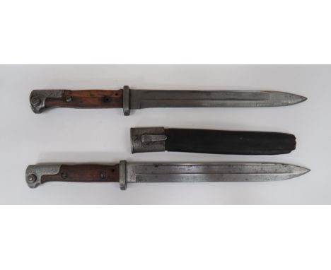 Two Imperial German Seitengewehr M1884/98 Bayonets 10 inch, single edged blades.  Wide fullers.  Forte with maker ‚'Weyersber