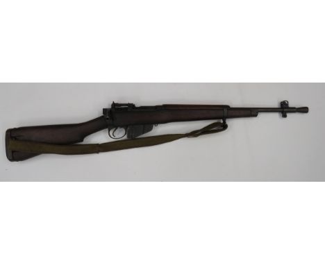 Deactivated No5 Jungle Carbine .303, 20 /12 inch barrel. Front flash hider and side protected sight. Blackened breech with re