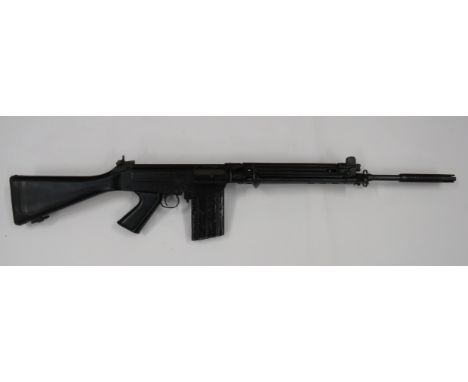 Deactivated Steyr L1A1 Style Self Loading Rifle 7.62 mm, 22 1/2 inch, blackened barrel with front flash hider.  Top gas port 