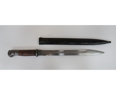 Imperial German Seitengewehr M1914 Sawback Bayonet 12 1/4 inch, single edged blade.  Rear sawback edge.  Wide fuller.  Forte 