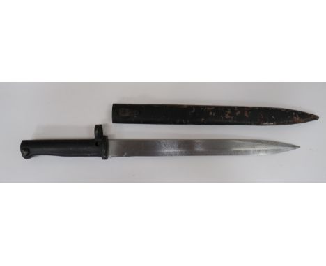 Imperial German Ersatz Bayonet 12 inch, single edged blade with sharpened back edge point.  Steel stepped, three quarter muzz