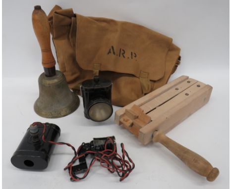 Selection of Various WW2 ARP Items consisting brass hand bell with wooden handle.  The bell stamped ‚'ARP‚' and ‚'J.B. 39‚' .