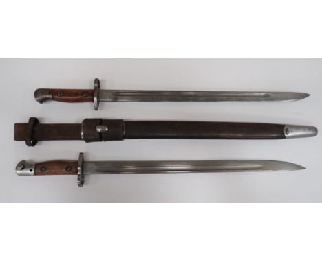 Two British P1907 SMLE Bayonets 17 1/4 inch, single edged blades with narrow fuller.  Forte to one by ‚'Wilkinson‚' dated ‚'4