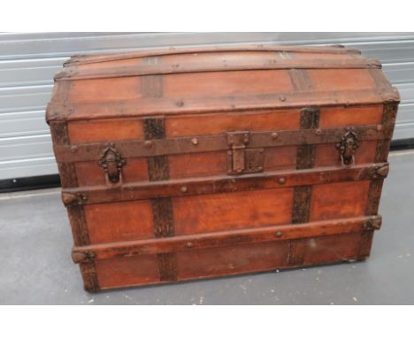 Vintage Wooden Dome Top Steamer Trunk wooden, dome top trunk with steel edging and banding.  Lower rollers.  Some wear.   