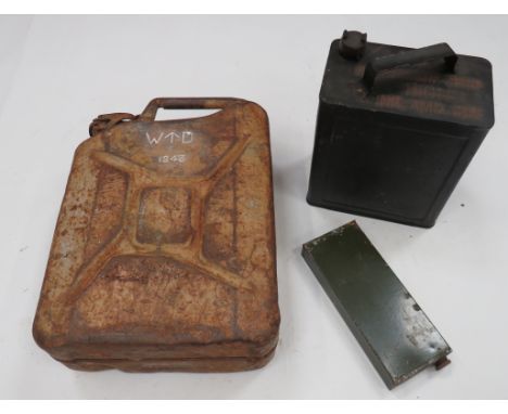 Two Various Fuel Cans consisting khaki painted, jerry can.  The side with ‚'WD‚' broad arrow and date ‚'1943‚' ... Black pain