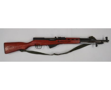 Deactivated Chinese SKS Assault Rifle 7.62 mm, 20 1/2 inch, blued barrel.  Front hooded sight.  Lower mounted, folding crucif