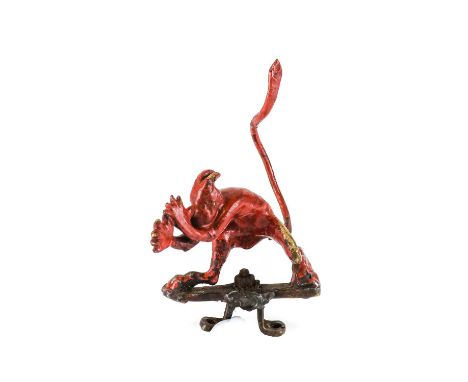 A Red Painted Cock-A-Snook Vintage Mascot, with original mounting bar, 8cm high
