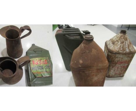 Two Vintage Agricultural Fuel Cans, Two Oil Pourers, A Profile Cut Motor Oil Can and A 1976 Military Fuel Can
