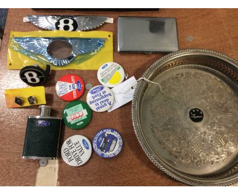 Automobilia, to include: A Ford Capri silver plated and engraved circular tray, a Ford chrome plated cigarette case, a small 