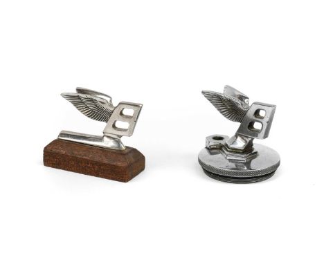 A Bentley Winged Chrome Car Mascot, mounted on an engine-turned circular radiator cap, 7cm high, and A Smaller Bentley Winged